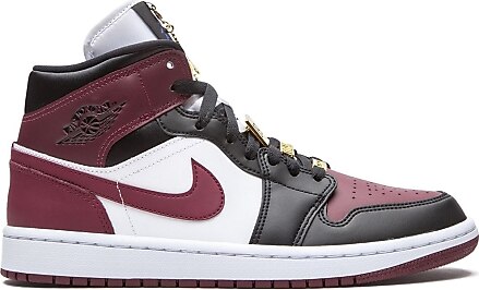 Nike jordan gold and black sales